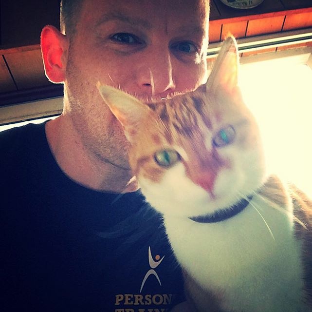 Phil Sims and Ginger the Cat